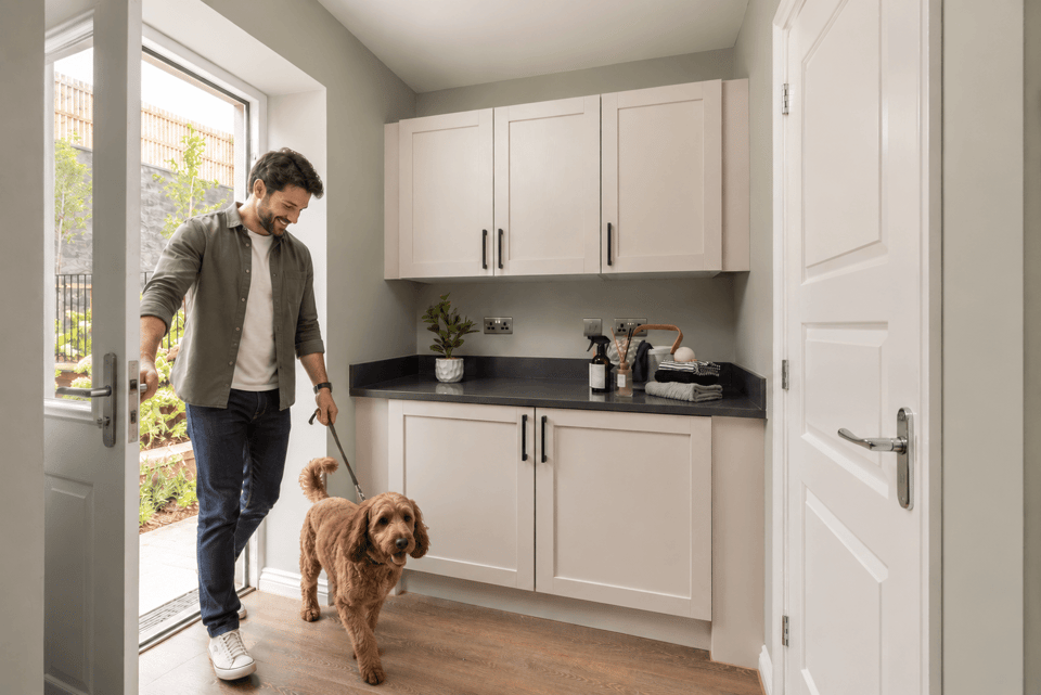 Man and Dog Entering a Bright Utility Room-2